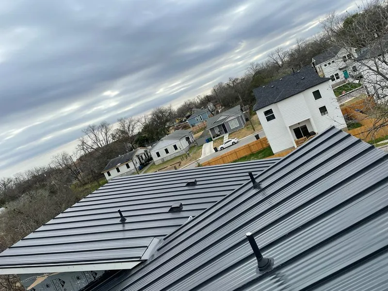 Standing seam metal roof panels with vents for Skylight Repair in Glendale Heights